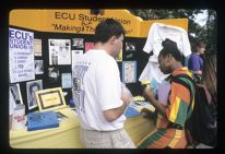 Students talking at an ECU Student Union stand